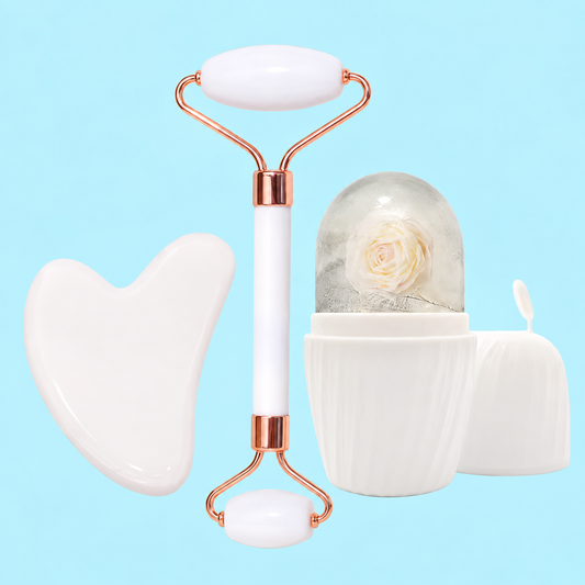 White facial ritual set with dual-ended roller, gua sha and ice mold